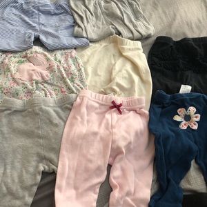 7 pairs of pants size 6-9 months
